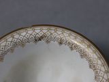 a close up of a plate on a table