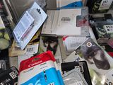 a lot of different ink cartridges on the floor
