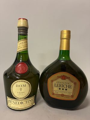 two bottles of liquor sitting next to each other on a table