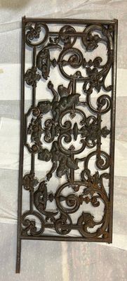 pair of antique cast iron wall panels with scroll design