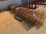 a pile of steel bars stacked on top of each other