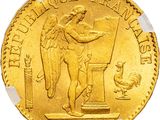 Gros plan sur une pièce d'or ornée d'un ange