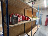 a room with shelves and shelves filled with different types of items