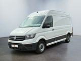 the white van is parked in the empty room of the building
