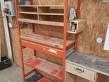 a shelf that has some shelves on it in a room