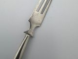 a fork that is sitting on top of a table