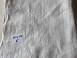 an image of a piece of cloth with a price tag on it