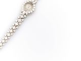 a diamond and white gold bracelet, by cartier