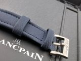 a blue strap that is attached to a black case