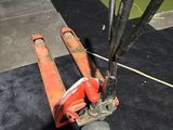 a fork lifter that is sitting on the floor