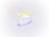 a white oplite stone on a white surface with a white background