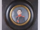 portrait d'un homme en uniforme militaire dans un cadre noir