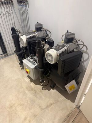 many different types of air compressors in this room