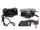 three different types of cameras on a white background