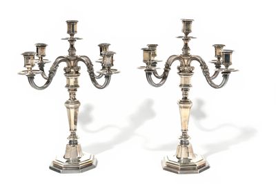 pair of silver plated candelabs with candlesticks on stands