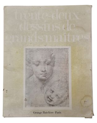 un vieux livre sur lequel figure le dessin du visage d'une femme