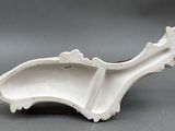 a small white object that is on a table