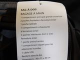 a label on the back of a bag that says sac a doss