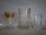 three vases sitting on a table next to each other
