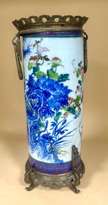 a vase with a blue and white design on it