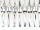 a lot of spoons and spoon spoons on the table
