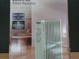 un radiateur électrique à huile dans son emballage