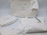 white baby gift set with hat, mittens, diaper, and blanket