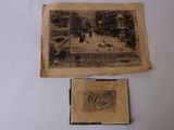 an old photo of a couple of old books on a table