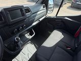 a view of the inside of a vehicle from the driver ' s seat