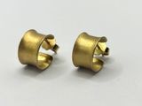 a pair of gold earrings on a white background