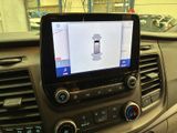 a picture of a car dashboard with a tablet on it