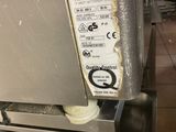 a picture of a machine that has a label on the side of it