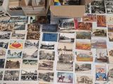 many old postcards on the floor of this room