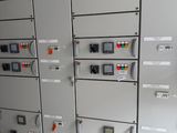 a bunch of electrical equipment that are on the wall