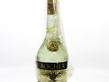 a bottle of rummel on a white surface