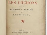an open book with a red star on the front cover