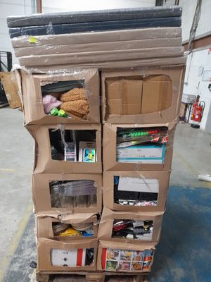 boxes stacked on top of each other in a warehouse