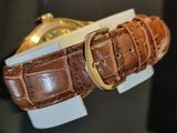 a close up of a watch on display in a store