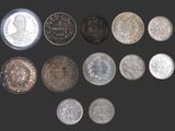 une image représentant un groupe de pièces de monnaie sur fond noir