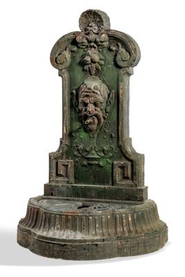 a statue of a man with a beard on a pedestal
