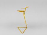 a yellow metal stand with a tray on top of it