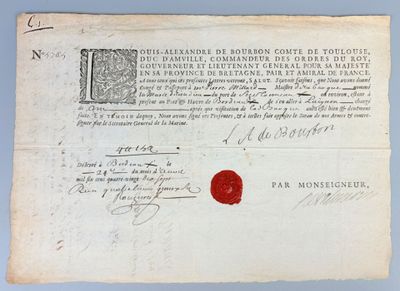 an old document with a red wax stamp on it