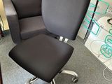 a chair that is sitting in the corner of a room