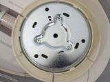 an overhead view of a light bulb and a light switch