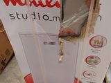 a box that has a microwave inside of it