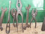 a lot of tools that are sitting on a table