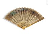 an image of a gold and green fan on a white background