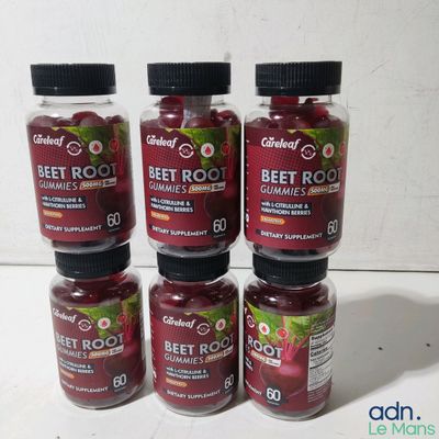 six bottles of beet root gummies sit on a table