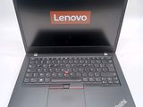 lenovo laptop computer with a red lenovo logo on the screen
