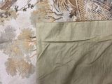 a close up of a pair of pants on a bed